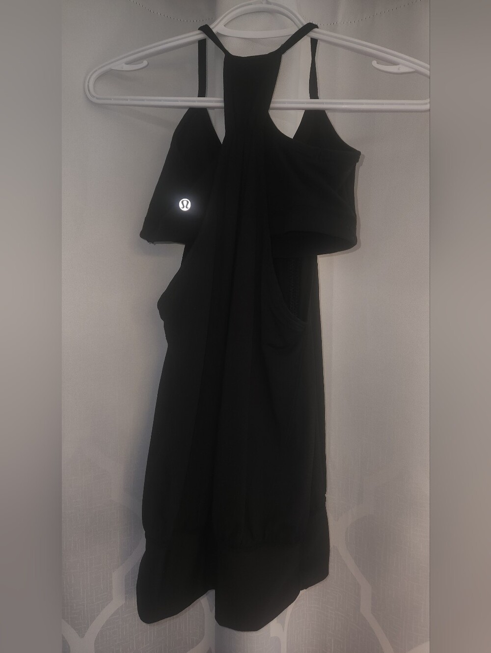 Lululemon No Limits black racerback tank top featuring a built-in shelf bra. sz